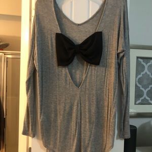 Grey open back with bow boutique top